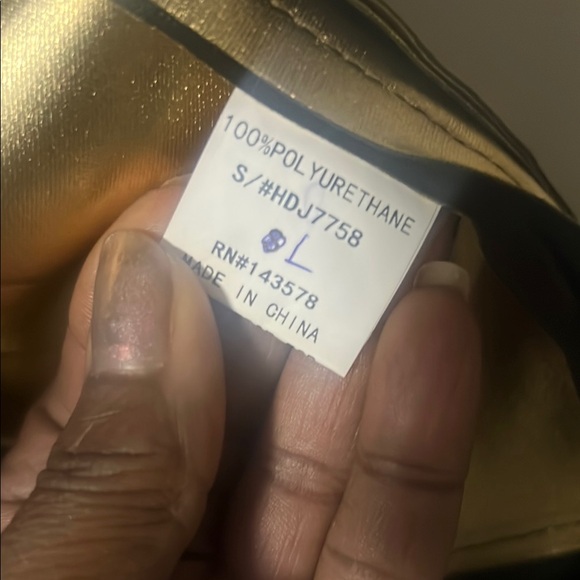 Black Leather Jacket with Edgy Metallic Details - Picture 6 of 6